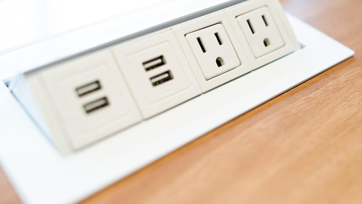 How Electricians Install a Kitchen Countertop Pop-Up Electrical Outlet